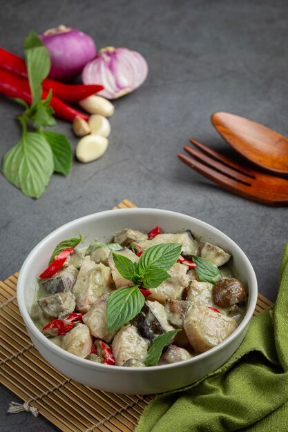 Thai food. green coconut curry pork with eggplants