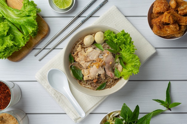 Thai food. Noodles with pork, meatball and vegetable