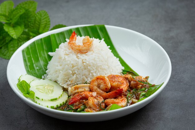 Thai food; Shrimp and squid fried cooked with long beans and rice.