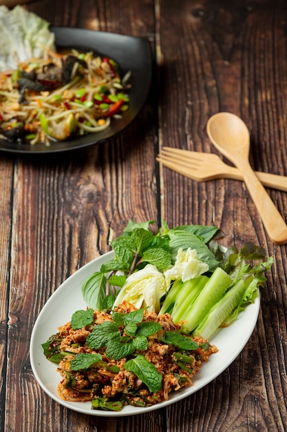 Thai food;spicy minced pork serve with side dishes