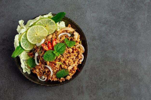 Thai food with spicy minced pork serve with side dishes