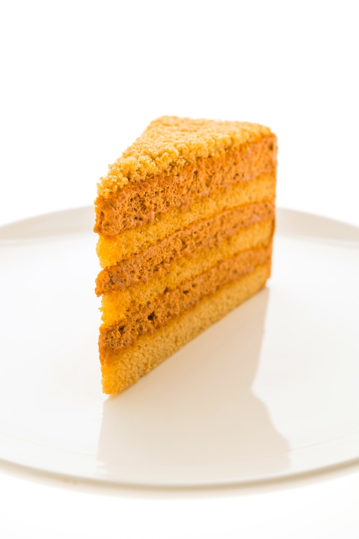 Free Photo thai tea cake in white plate