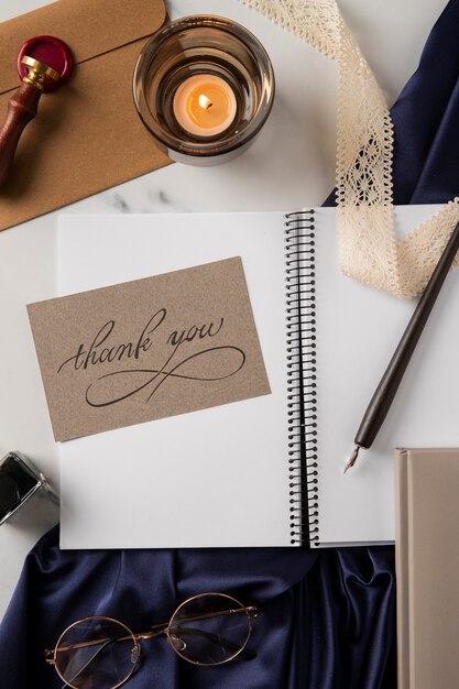 thank you note and candle arrangement top view
