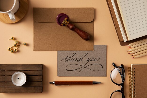 Thank you note and wax stamp flat lay