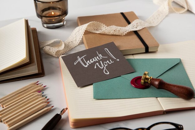 Thank you note and wax stamp high angle