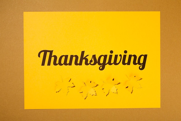 Free photo thanksgiving lettering on paper