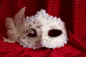 Free photo theater mask on red curtain