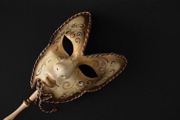 Theater mask with dark background still life