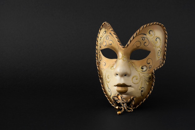 Theater mask with dark background still life