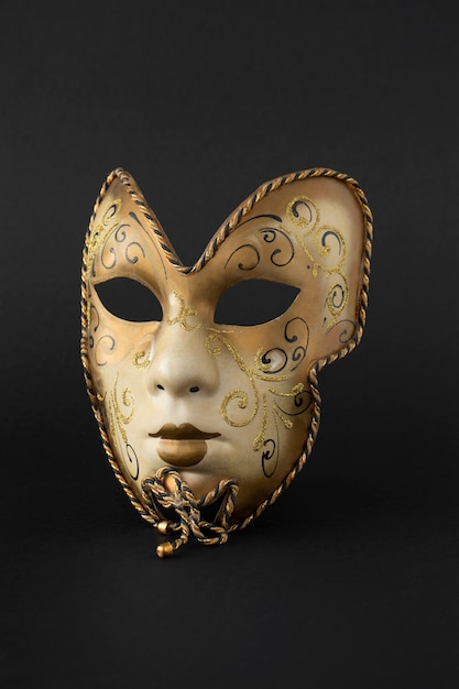 Theater mask with dark background still life