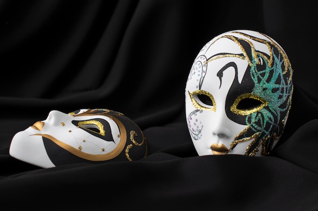 Theater masks with dark background still life