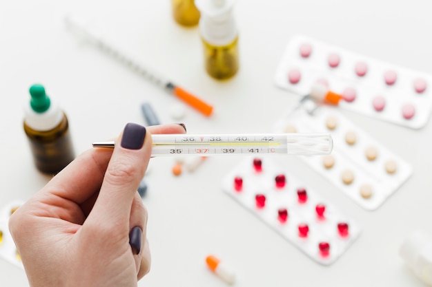 thermometer and medical pills