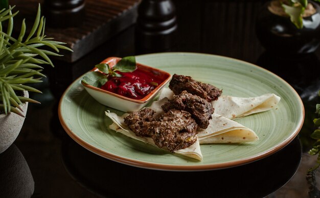 Thin langets served with tomato paste and lavash