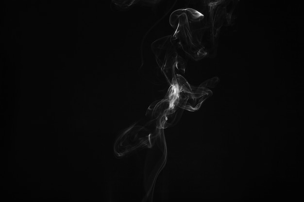 Thin smoke on dark background