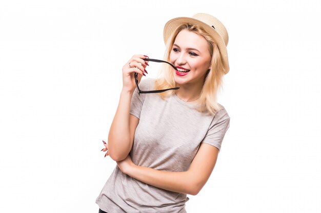 Thinking beautiful young woman in hat and transperent glasses