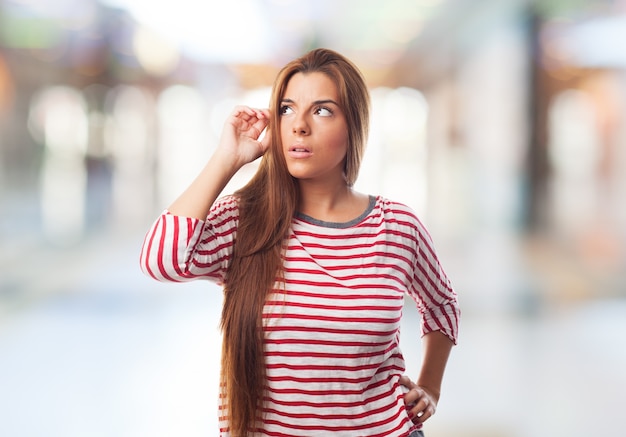 Thinking female on a blurry background