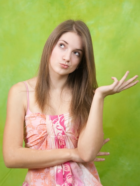 Free photo thinking long-haired girl