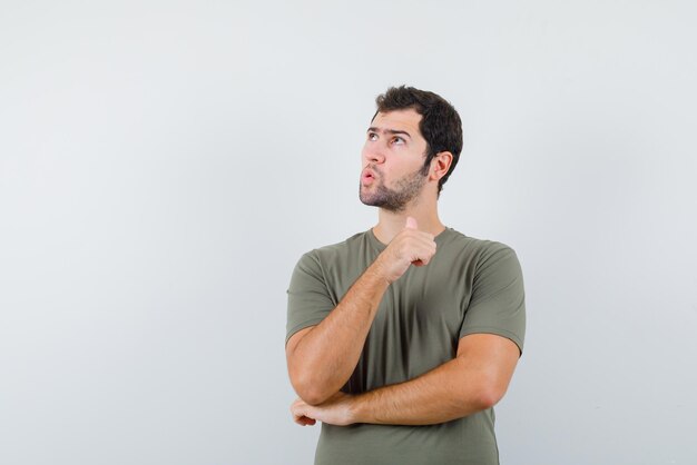 The thinking man is showing his thumb on white background