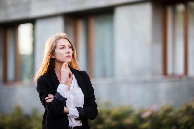 Thinking woman looking away