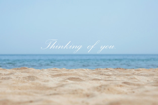 Free photo thinking of you text over image of beach