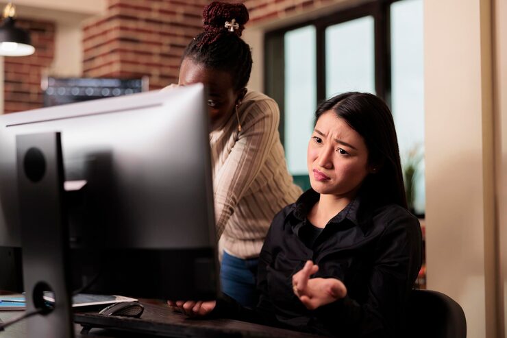 Free Photo thoughtful engineers brainstorming ideas to write code and create security program, displaying artificial intelligence algorithm. pensive software developers thinking about database cloud computing