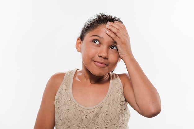 Thoughtful girl with her hand on head