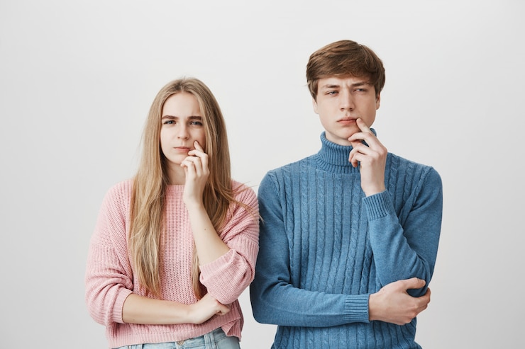 Free Photo thoughtful guy and girl thinking. couple pondering decision
