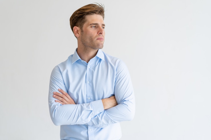 Free Photo thoughtful handsome man looking away
