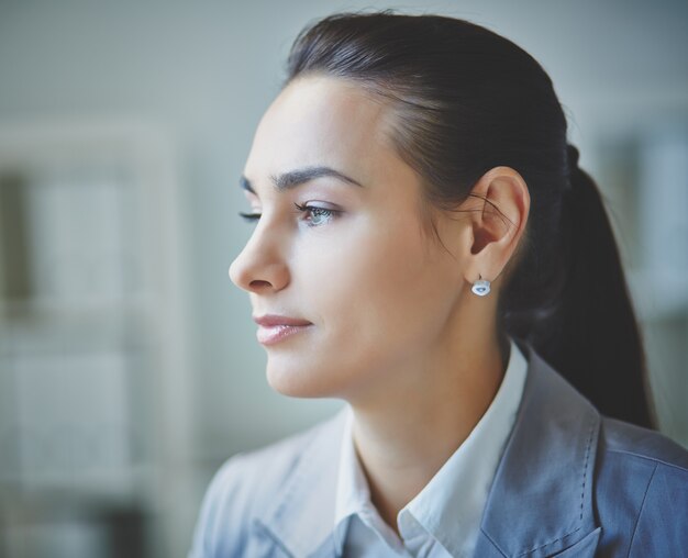 Thoughtful secretary in the office