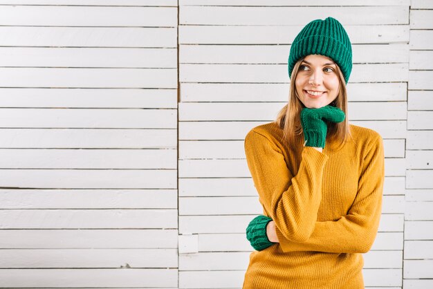 Thoughtful woman in warm clothes 