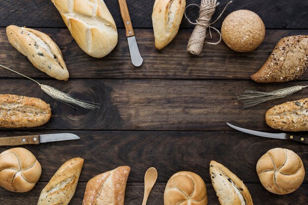 Thread and knives near bread