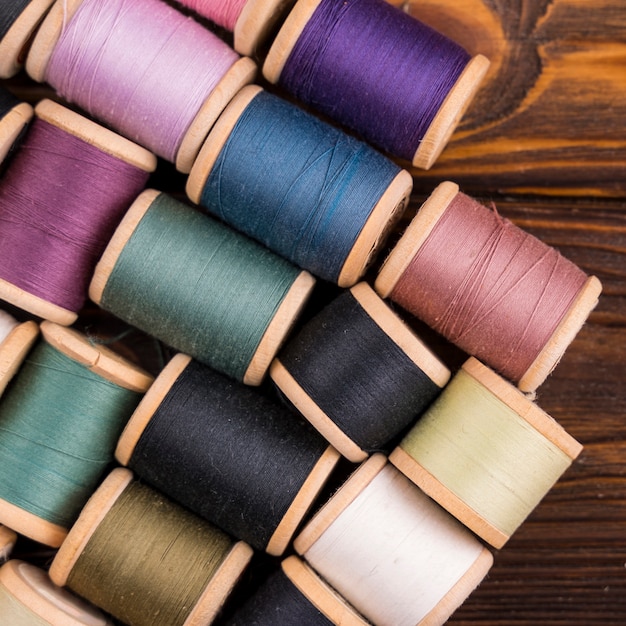 Thread spools on wood table