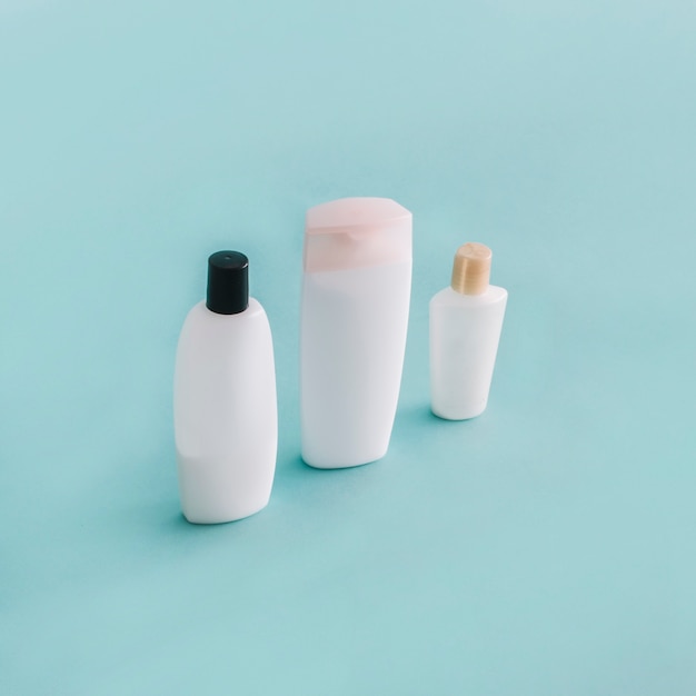 Three bottles with smooth cosmetics