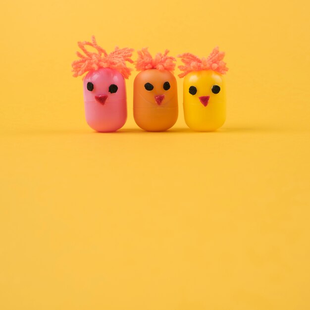Three chickens made of egg toy boxes 