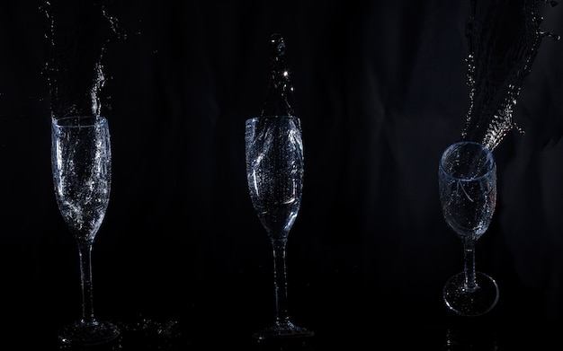 Free photo three crystal glasses with water