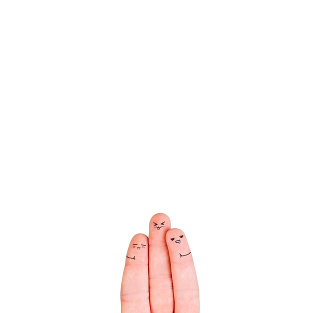 Three fingers with faces on white