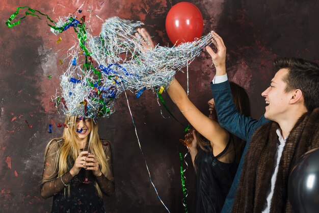 Three friends celebrating new year