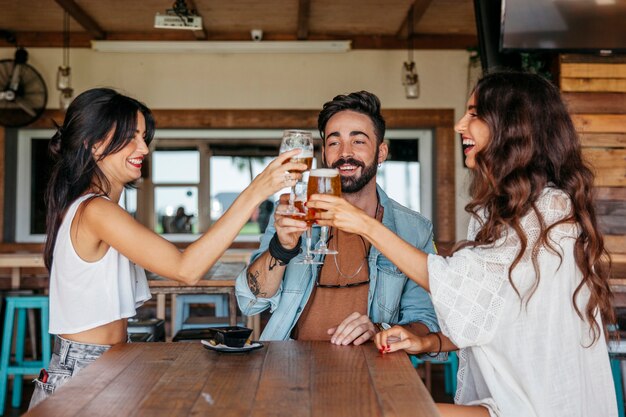 Three friends toasting