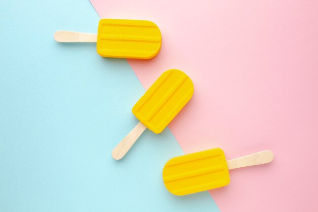 Three ice creams on table