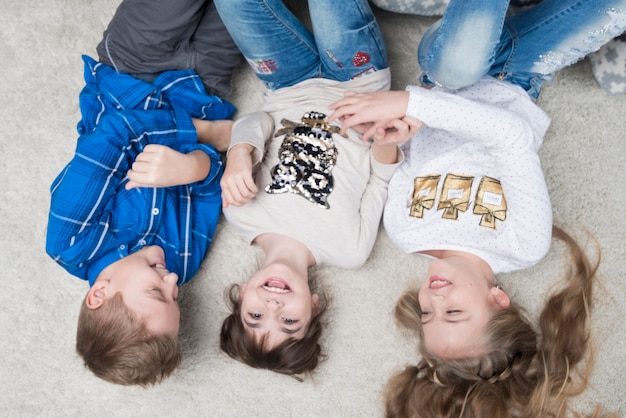 Three laughing kids