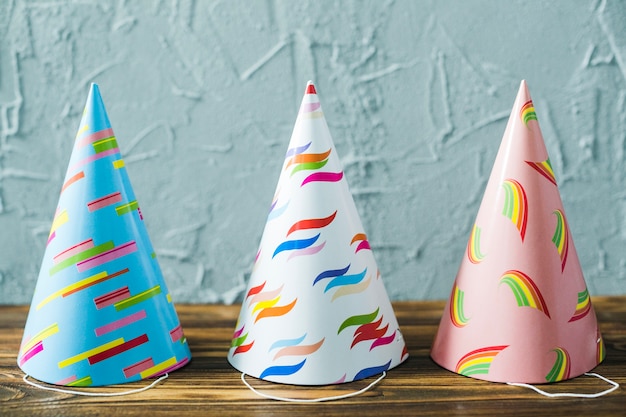 Free photo three party hats on table