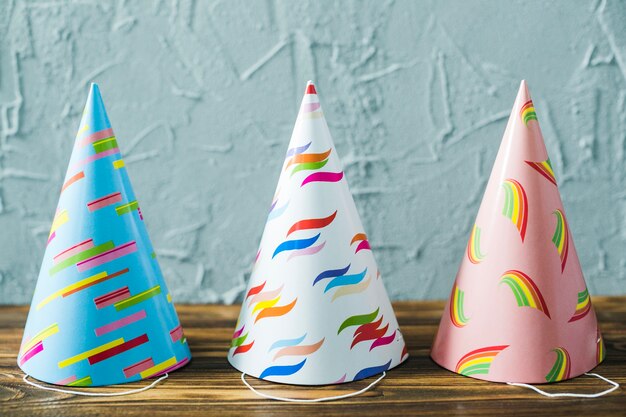 Three party hats on table