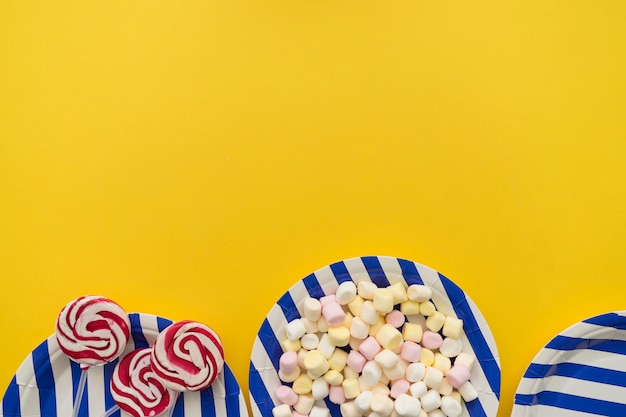 Three plates with candy