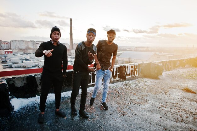 Three rap singers band on the roof