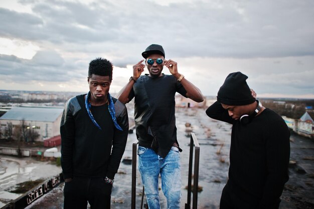 Three rap singers band on the roof