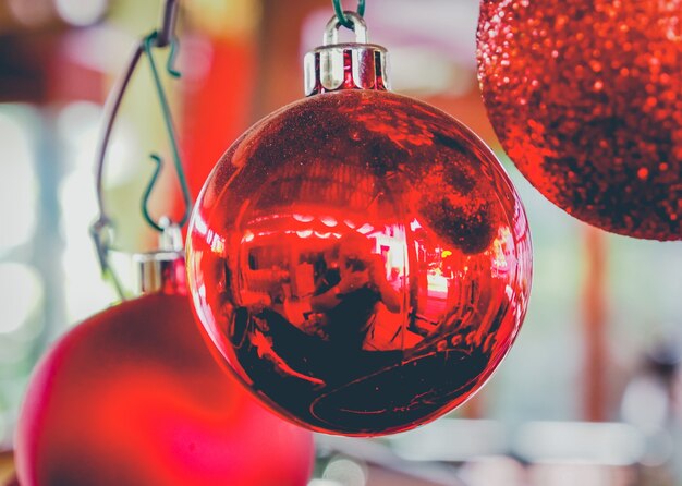 Three red christmas balls