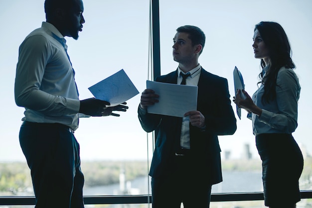 Three talking business people