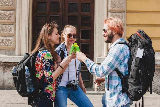 Three tourists eating ice cream