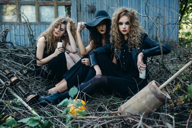 Three vintage women as witches