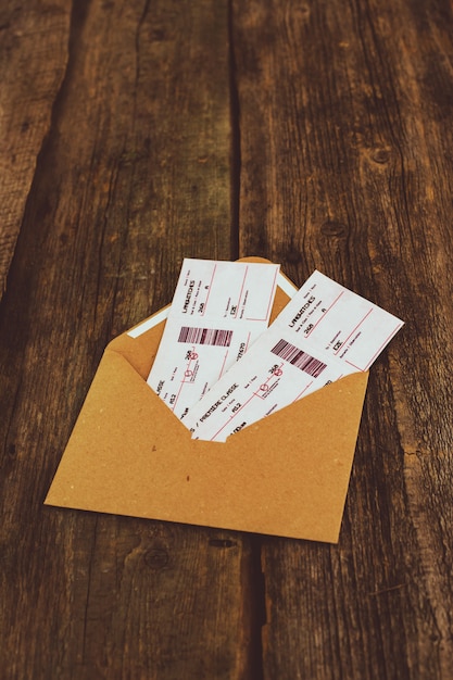 Free photo tickets on wooden table